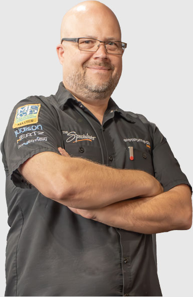Portrait of a car audio systems technician from The Specialists in Tucson, AZ